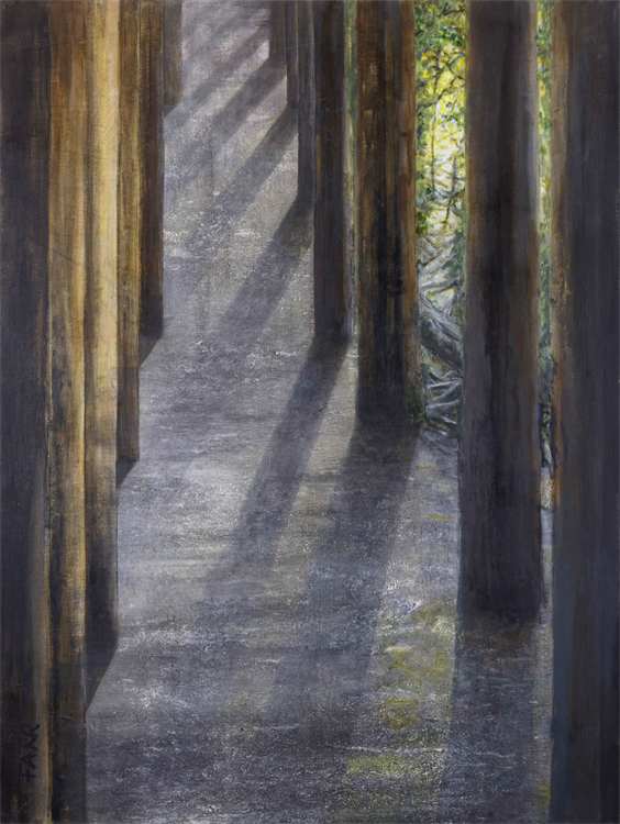 Light path through dark avenue of trees