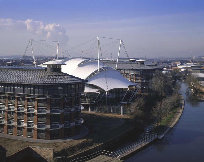 Distinctive and tent-like, the central building next to the canal with extensive backdrop of the Meadows and surrounding areas in Nottingham.
