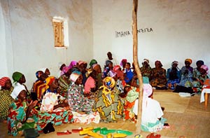 Large group of Rwandan women sat in a room