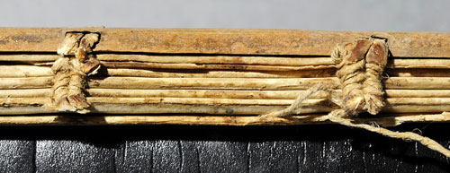 Medieval sewing evidence in the spine of WLC/LM/11