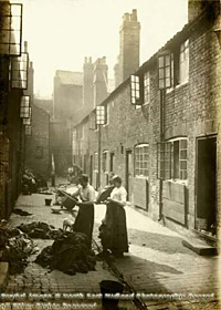 Women rag-picking in Rushton's Place off Bellar Gate, Narrow Marsh area, 1919.