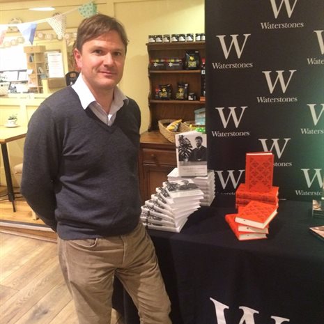 Dr Andrew Harrison pictured next to copies of his new biography, The Life of D. H. Lawrence in Waterstones, York