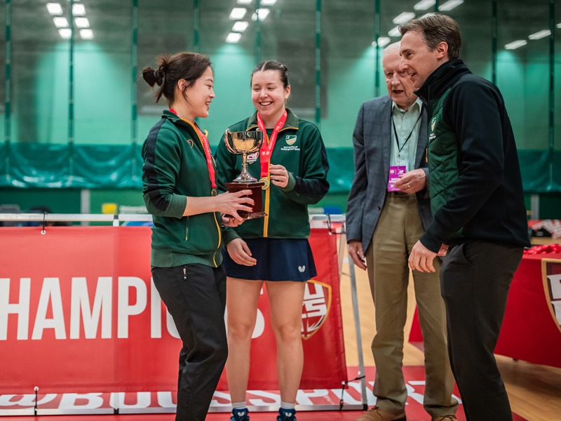 University of Nottingham Table Tennis players receiving the BUCS trophy