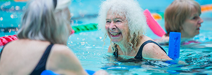 Two Classic Club members taking part in an Aqua Fit class in our swimming pool at David Ross Sports Village