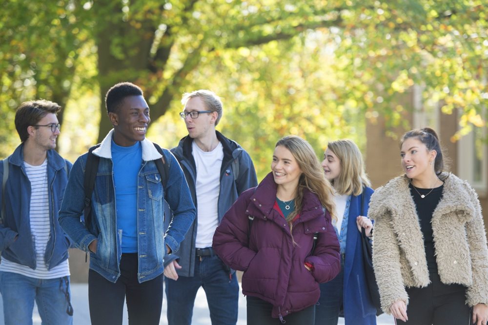 A group of students walking outside