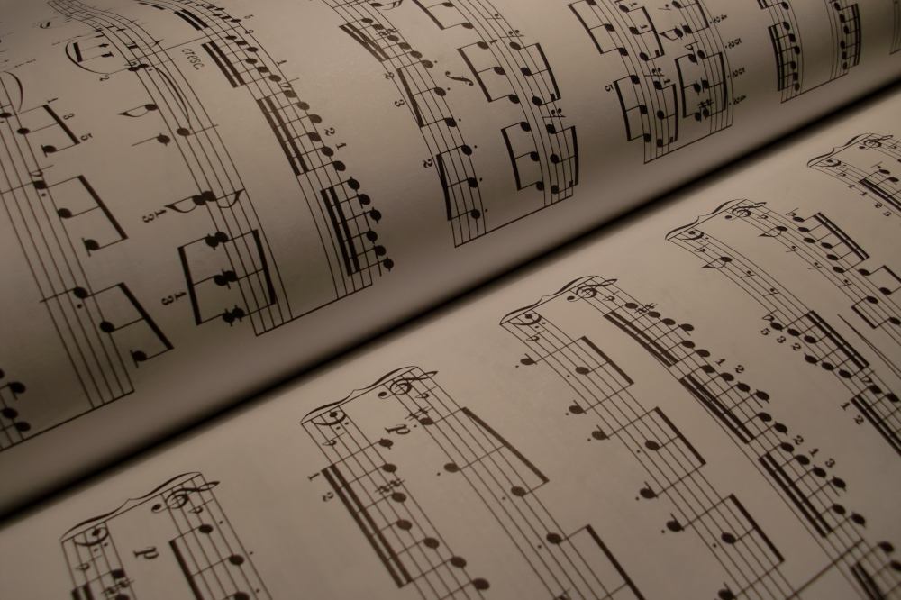 Close up of open book of sheet music