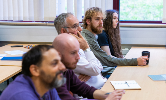 Attendees at a Particle Cosmology group seminar