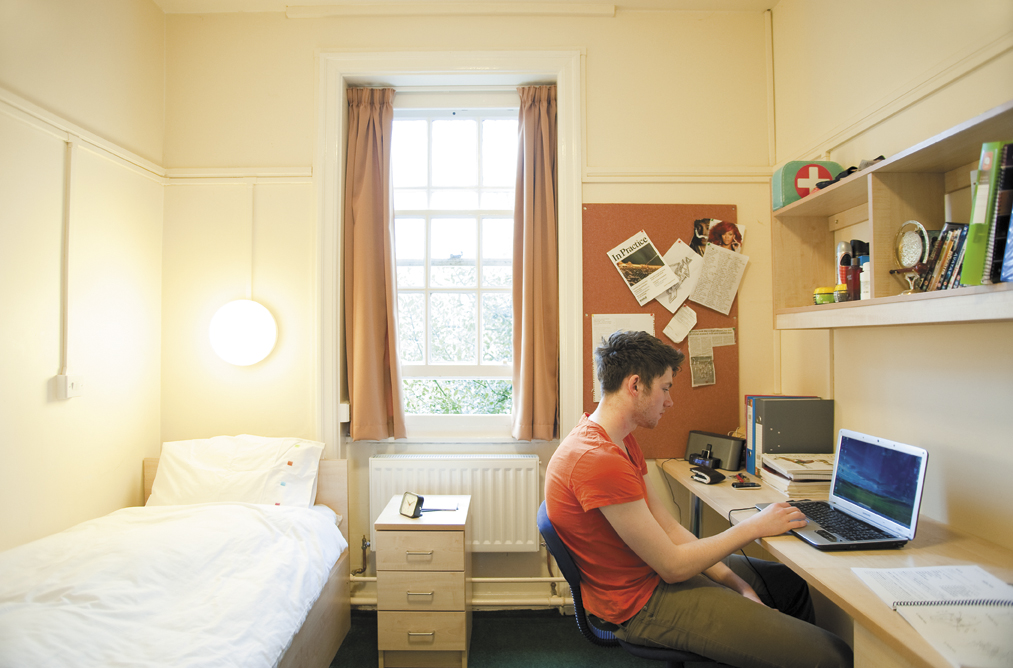 Student in bedroom at Sutton Bonington