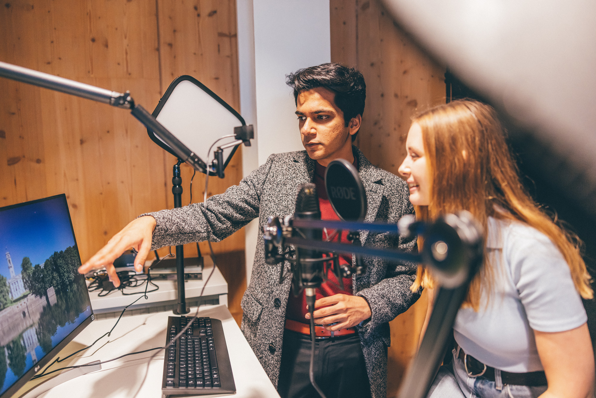 Two students working on a podcast