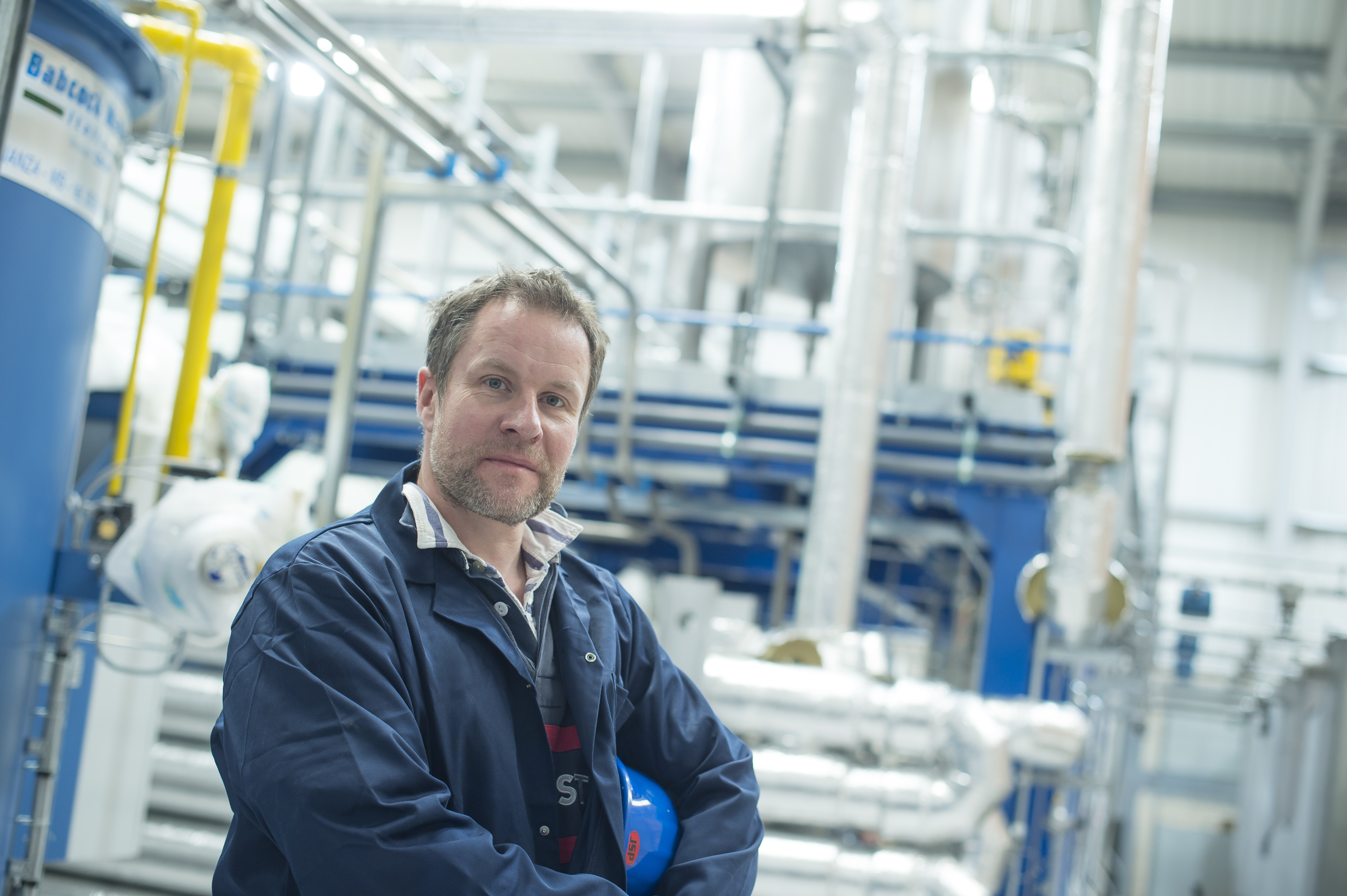Photograph of Ed Lester at the full scale chemical plant for nanoparticle synthesis