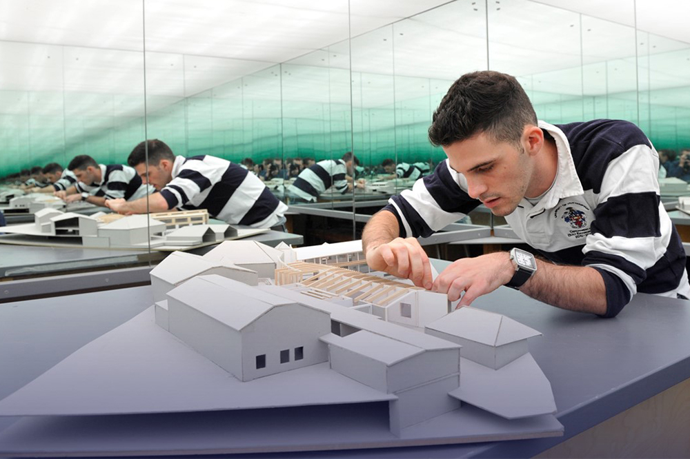 Architect student working on model