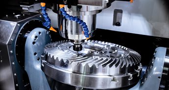 A computer numerical control (CNC) milling machine in action