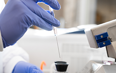 Pipette being used in medical research