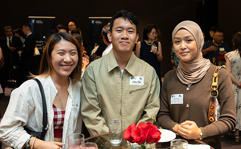Alumni at an event in Malaysia.