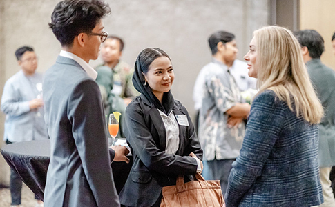 Alumni at an event in Singapore.
