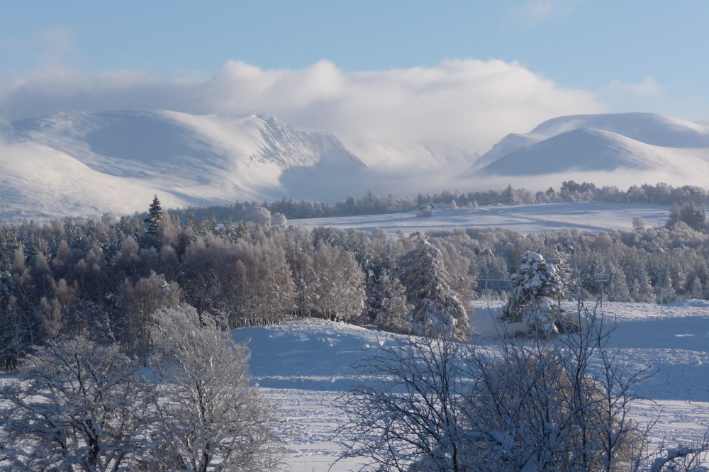 A photograph of the Cairngorm mountain range in Scotland