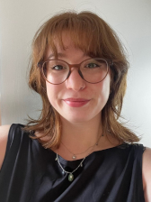 A head and sholders photo of Eve Goss