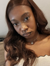 A head and shoulders photo of Nkira Byfield-Smith