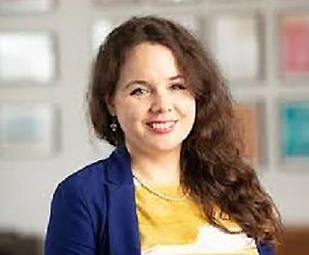 Professional head and shoulders photo of Dr Zsofia Toth.