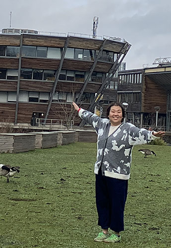Yuma Imamura, an MSc International Tourism Management and Marketing student, stood in front of the Djanogly Learning Resource Centre on Jubilee Campus.