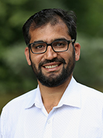 Professional head and shoulders photo of Subhan Ullah