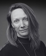 Head and shoulders photo of Megan Powell Vreeswijk, in black and white.