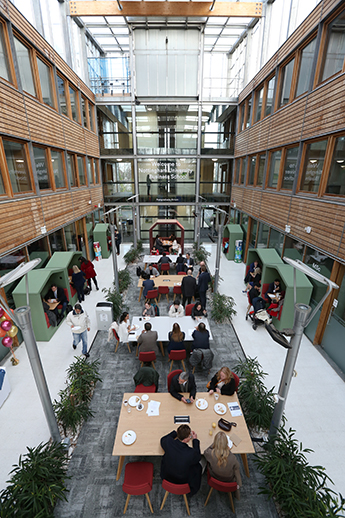 Staff and students in Business School North PG atrium