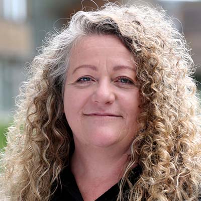 Professional head and shoulder photo of Clare Foster