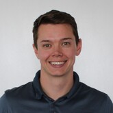 Head and shoulders photo of Gary Chapman. Gary has dark hair and is wearing a dark shirt.