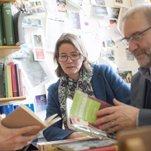 Staff members reading foreign language textbooks together