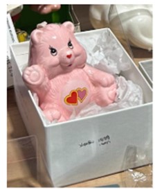 Love-A-Lot Bear figurine.