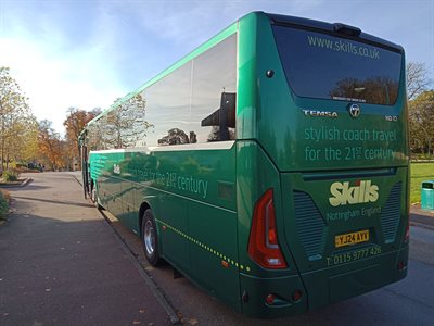 Coach used for travel to and from Melton Carnegie Museum