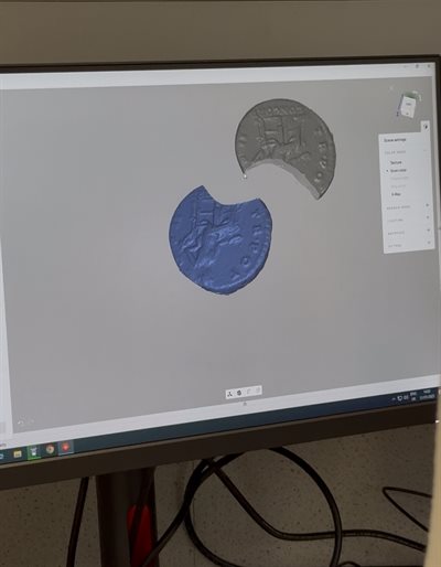 The Aztec 3D Scanner showcasing its great ability to capture intricate details of the coins' surface