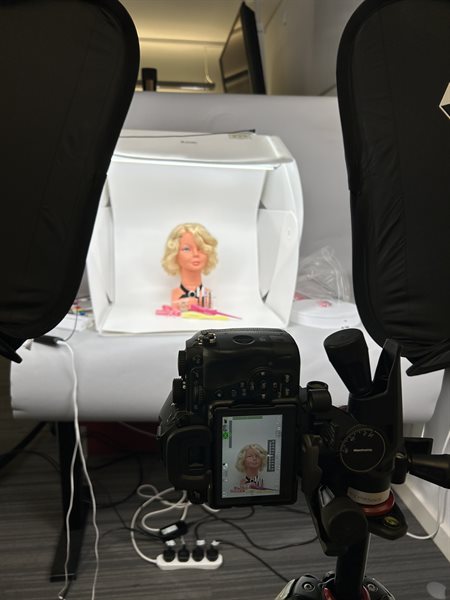 The 'Girl's World' makeup and hairstyling model and associated accessories being 3D photogrammed at the Digital Transformations Hub.