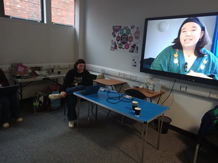 Hannah Kane introducing her digital story during the 'premier' session.