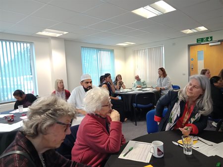 Attendees listening to Alison Clague (Senior Curator) and Caroline Lockwood (Collections and Conservation Manager).