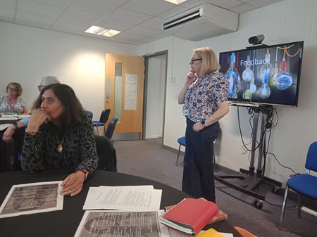 Alison leading the plenary session during which attendees fed back their contributions.