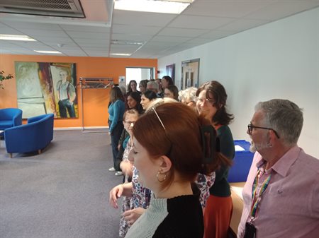 Attendees preparing for group photos at the end of what was a productive event.