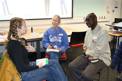 Emily, Esther, and Daniel during a round of 'speed meeting'