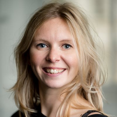 Head and shoulders portrait of Sophie Frost smiling