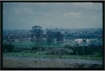 Slide showing view south from Keighton Hill, University of Nottingham, including the Lakeside Pavilion, the open-air Lido, and Wilford power station, photographed 7 April 1960