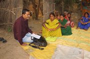 Rajiv asking questions to Nadubani SHGs