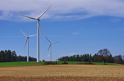 Photo of three windmills in a landscape