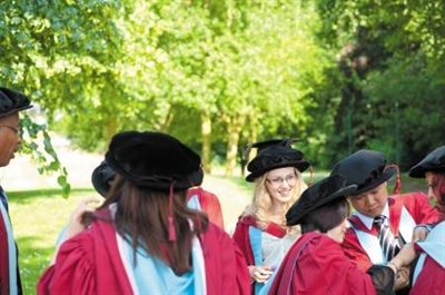PhD students at graduation.