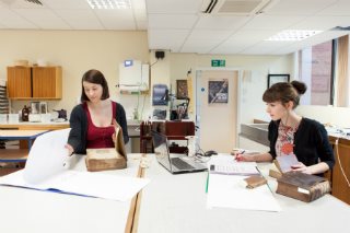 Two people working together