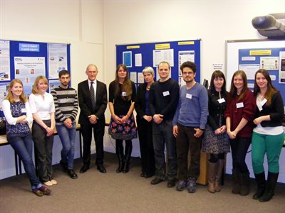 Group posing for photo with VC.