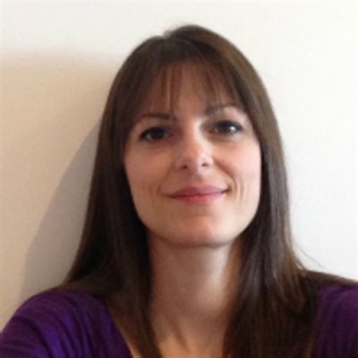 Headshot of Lydia Farina, smiling.