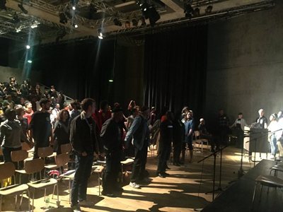 October Dialogues attendees hold hands in unity3