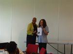 Nicola receiving award from Eunice