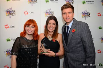 Izzie Clarke with BBC Radio 1 presenters Alice Levine and Greg James.